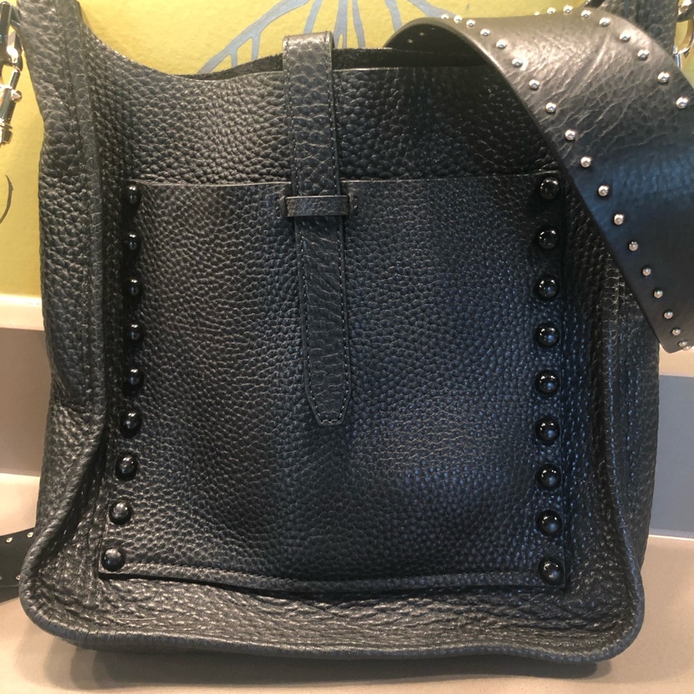 Rebecca Minkoff large feedbag and guitar strap.